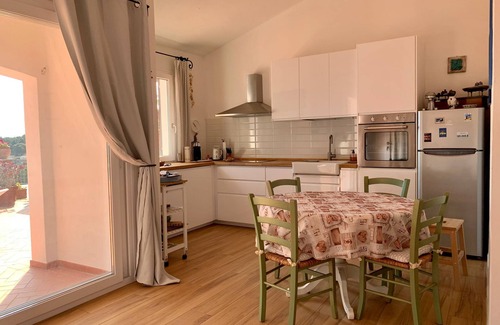 Capoliveri House | Sunrise in straccoligno renovated semi-detached house large garden sea view