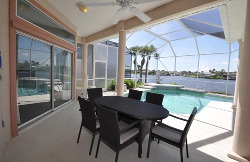 Palm Harbor House | Sunset Bay Beautiful Pool Home - Bring Your Boat or Jet Ski - Canal with Dock- Sleeps 10 - 4 BD