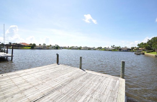 Palm Harbor House | Sunset Bay Beautiful Pool Home - Bring Your Boat or Jet Ski - Canal with Dock- Sleeps 10 - 4 BD