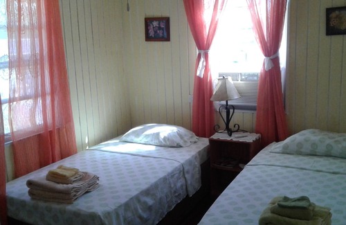 Fitts Village House | Sunset Breeze Guest House is perfect for your relaxing getaway.