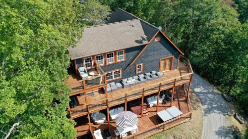Dandridge House | Sunset Cove Lakefront Luxury Lodge with Private Dock