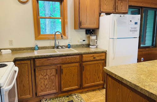 Hayward House | Sunset on the Bay 3-bedroom vacation rental on Nelson Lake w/Private Dock!