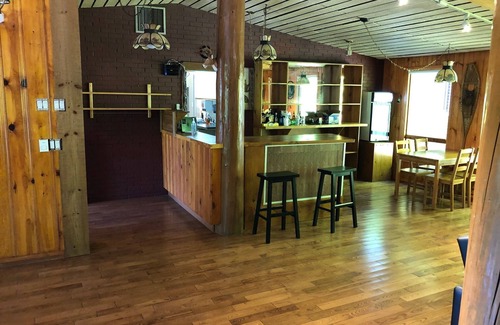 Dorset Apartment | Super Spacious 2300 SF Lounge Suite with Walk Out Deck, Sunroom, Foosball, Bar