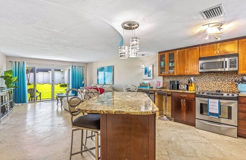 New Smyrna Beach Condo | Surfside 112: Ground-Level with Ocean View Patio, Steps to Pool & Beach
