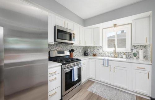 Parma House | Swim and Relax with a Pool Hot Tub and Renovated HomeHop