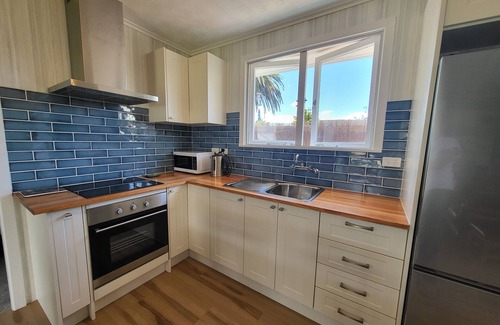 Taipa Apartment | Taipa Tides -Cosy two bedroom apartment 2 minutes walk to beautiful Taipa beach