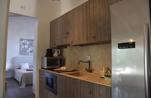 Triggianello House | TD Il Vecchio Fienile Outdoor Kitchen w/Pool View