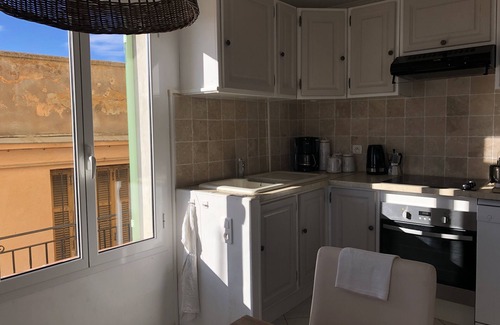 Menton Apartment | Terrace with stunning sea view and pergola with vines