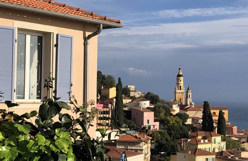 Menton Apartment | Terrace with stunning sea view and pergola with vines