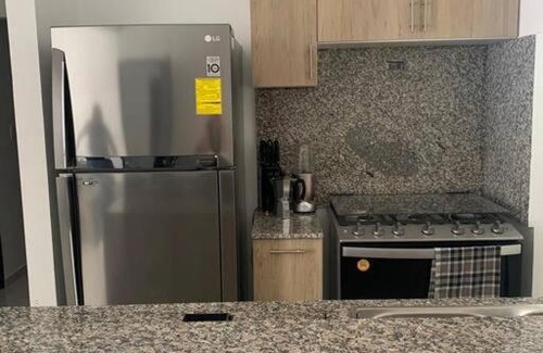 La Romana Apartment | Terrazas del Este, cuarto piso, terraza privada.