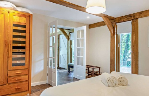 Woodmancote House | The Barn at Pigeon Cottage