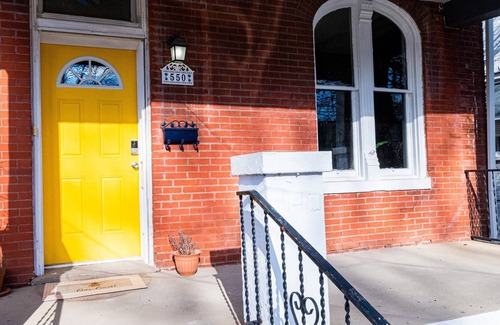 St. Charles Historic District House | The Brick & Morgan: History Meets Modern Home near Main Street; Pet Friendly