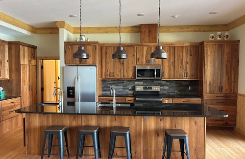 Park Rapids House | The Canopy with a wall of windows overlooking Big Sand Lake.