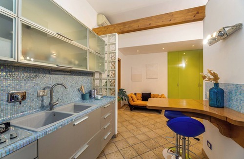 Tuscolano Apartment | The captain's cabin In style in this downtown space.