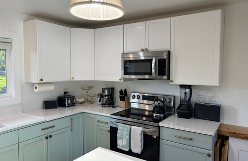 Garibaldi House | The Catch; relax in this stylish cozy home with views of the mountains & bay!