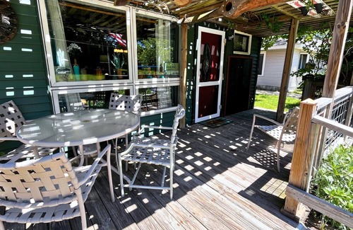 Manistee House | The Copper Cottage:Pet-Friendly, Hot Tub, Tiki Bar