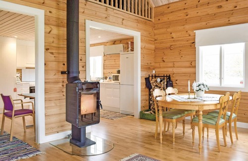Mariannelund House | The cottage has an open floor plan and is located in the countryside.