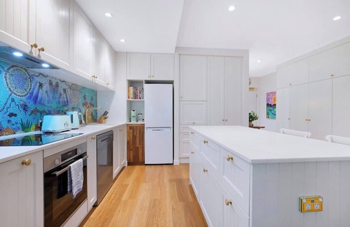 Bulimba Apartment | The Fish Bowl Vibrant Riverside Escape with Pool