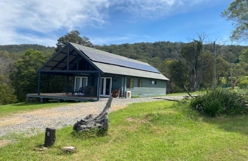 Bandon Grove Cabin | The Folly is a beautiful 2 bedroom holiday home with a log fire and fire pit.