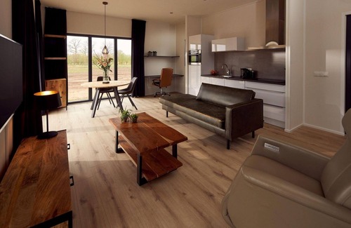 Kotten House | The holiday villa Amalia 2 is wheelchair friendly and has a cozy, spacious, and homely living room with an open kitchen, 1 bedroom, and a spacious outdoor area.