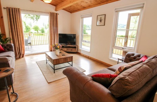 Newnham House | The Log Cabin