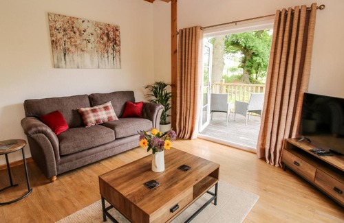 Newnham House | The Log Cabin