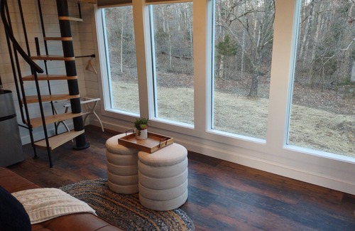 Troy Cabin | The Nest, reconnect with that special someone in our charming birdhouse!