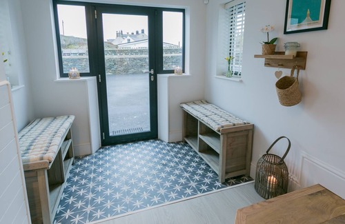 Trearddur Bay Cottage | The Old Abbey - a hot tub that sleeps 16 guests in 6 bedrooms