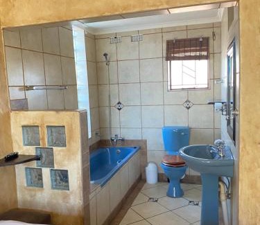 Phalaborwa Apartment | The Orange room