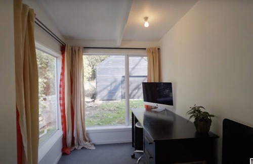 Purakaunui House | The perfect Weekender! Funky beach house made up of a 1900's Railway Carriage.