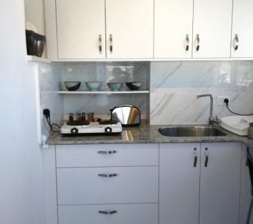 Haifa Apartment | The Potter's House overlooking the Bay of Haifa