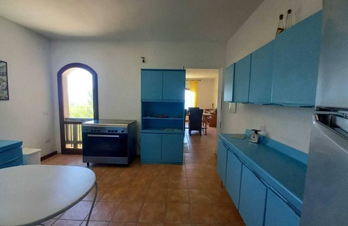 Sa Rocca Tunda Villa | The Sound of the Sea. House on the beach, surrounded by greenery, Sardinia.