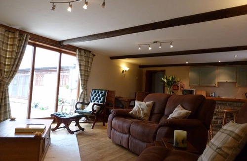 Hornsea House | The Stables, Stunning Barn Conversion, Sleeps 4, Grounds overlook Hornsea Mere