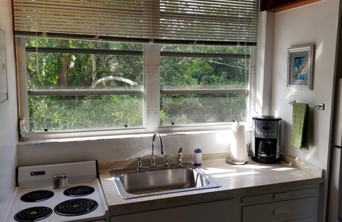 Melbourne Village Apartment | The Treehouse:Treeline View, Screened Porch, Private Balcony