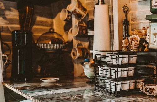 Elmo Cottage | The Treehouse, with a deck for grilling and relaxation.