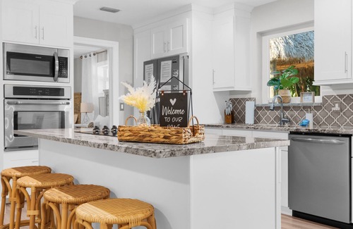 Riverside House | The W House Jupiter- Minutes from the beach! Heated Pool and Tiki Hut