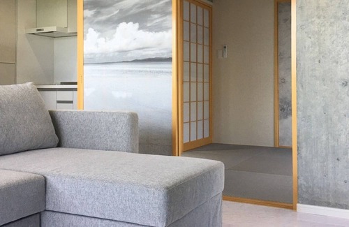 Higashionna House | Theme Suite 101 Overlooking the sea A modern mansion designed by an architect and a photographe/Uruma Okinawa