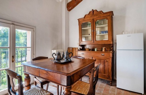 Colorno Apartment | This apartment is located on the top floor of a country villaCharacterized by large spaces including an inviting very bright living room thanks to large windows, a kitchen and a large bedroom accessible via a spiral staircaseAmong the common areas a beau