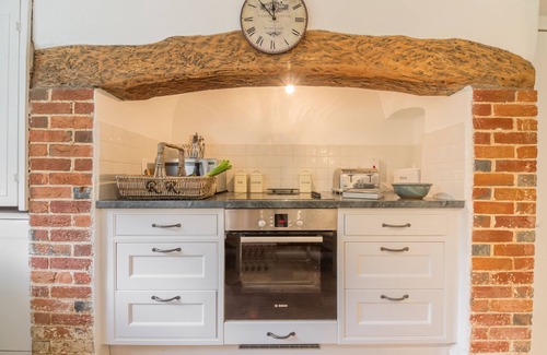 Ebbesborne Wake Cottage | This beautiful 300-year-old detached thatched cottage nestled within the stunning Cranborne Chase.