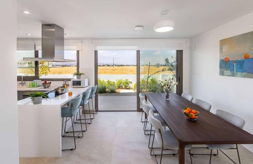 Softades House | This brand-new villa, situated on an exclusive gated development with landscaped gardens, is only mi