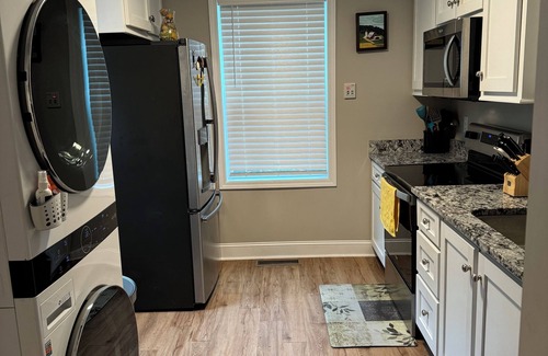 Sumter House | This charming 2-bed, 1-bath house offers a warm sanctuary for those on the go.