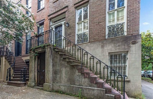 Old West Broad Neighborhood Apartment | This Classical Parlor is located on Chatham Square. It offers a quiet retreat with natural light, floor-to-ceiling windows, and views of the Square.