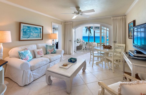Reeds Bay Condo | This Penthouse is situated directly on a beautiful sandy beach and has a wonderful roof deck terrace