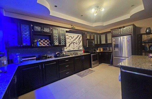 Claxton Bay House | This spacious property features a fully equipped kitchen, and an inviting small pool