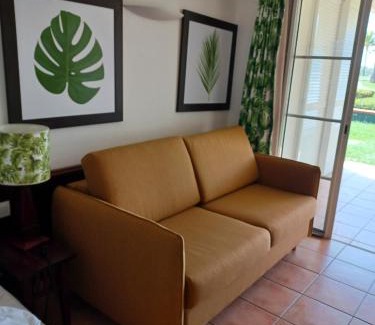 Gros Raisins Apartment | Ti Rhum Passion vue mer dans célèbre Village de Vacances