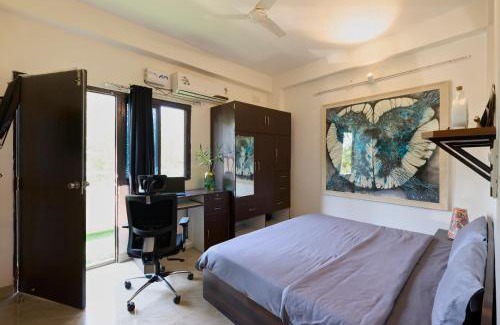 Lake Swaroop Sagar Apartment | TicAna 2 bedroom living & Kitchen with lake view garden rooftop