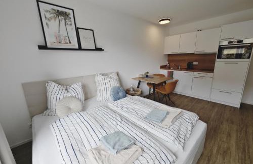 Metzingen Apartment | TiCasa WAVE-Zentral-Outlet-Aufzug-Stylisch-Unique