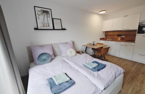 Metzingen Apartment | TiCasa WAVE-Zentral-Outlet-Aufzug-Stylisch-Unique