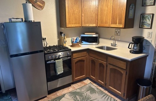 Wainiha Cottage | Tiki Hut Cottage - Lush Tropical Garden, ;Walk to Tunnels Beach TVNCU#5161