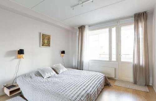 Kallio Apartment | Tilava ja moderni kolmio Kalliossa